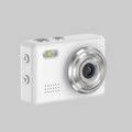 White digital camera with silver accents on a white background