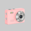 Pink digital camera with silver lens on a white background